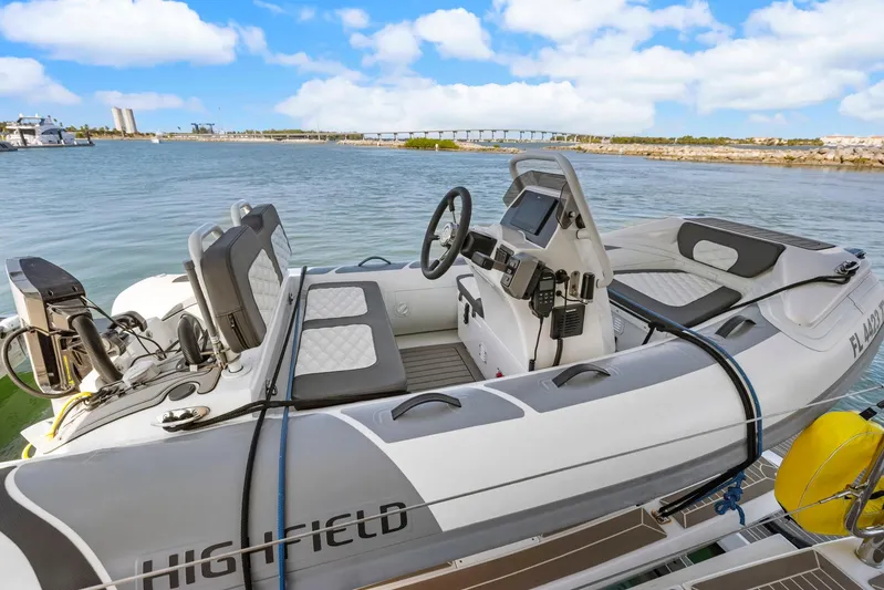 Prelude Yacht Photos Pics 2024 Leopard 46 Powercat with modern helm, docked by scenic waterfront.