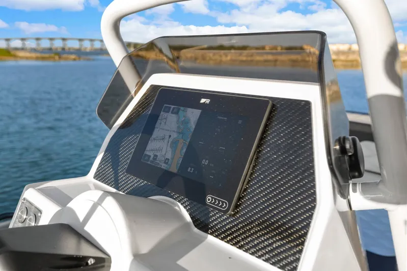 Prelude Yacht Photos Pics 2024 Leopard 46 Powercat dashboard with navigation display on water.