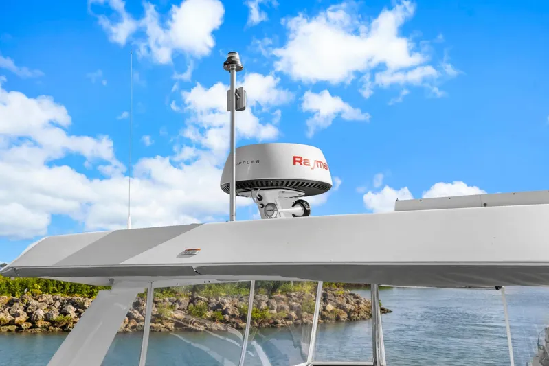 Prelude Yacht Photos Pics 2024 Leopard 46 Powercat radar system against a bright blue sky.