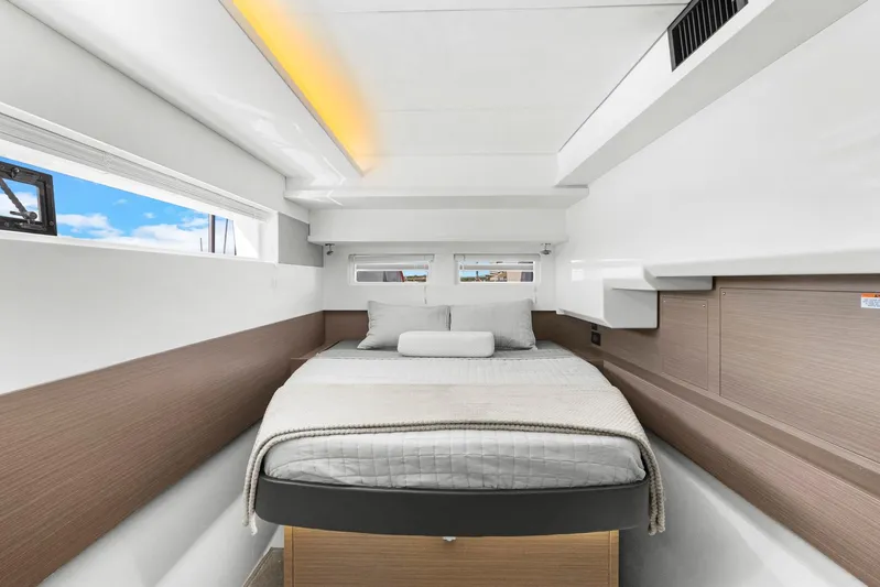 Prelude Yacht Photos Pics Luxurious cabin interior of 2024 Leopard 46 Powercat with modern design and comfortable bedding.