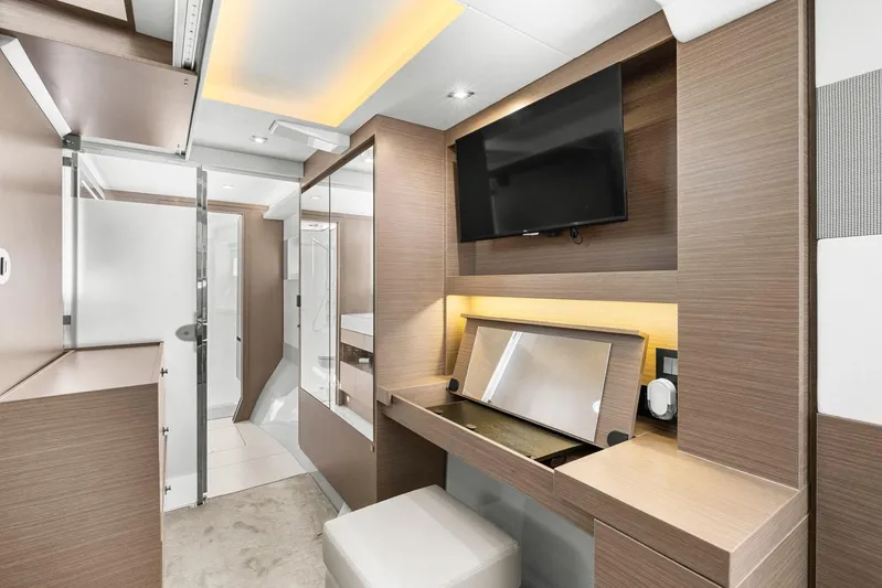 Prelude Yacht Photos Pics Luxurious interior of 2024 Leopard 46 Powercat with modern wood finish and TV.