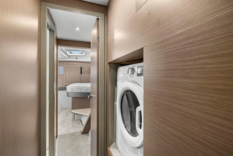 Prelude Yacht Photos Pics 2024 Leopard 46 Powercat interior with washer and bedroom view.