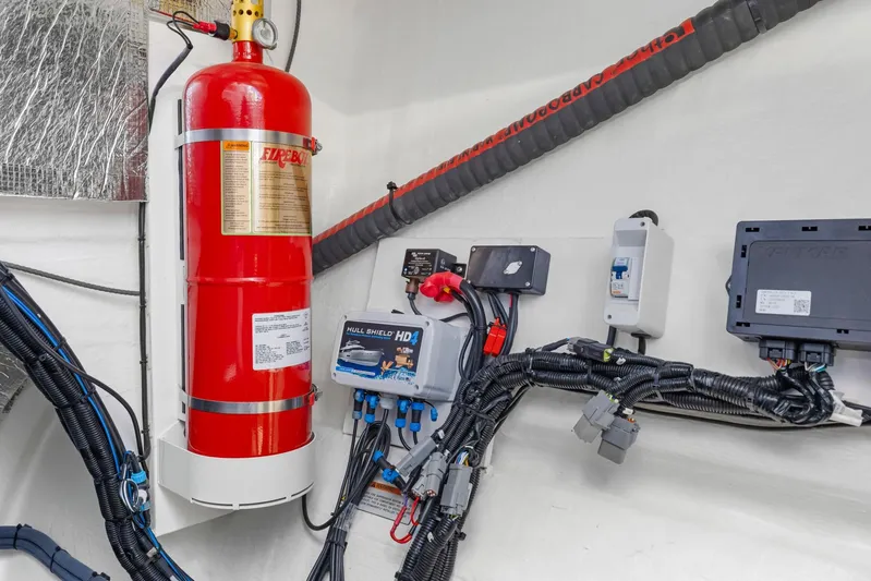 Prelude Yacht Photos Pics Engine room of 2024 Leopard 46 Powercat with fire extinguisher and electrical components.