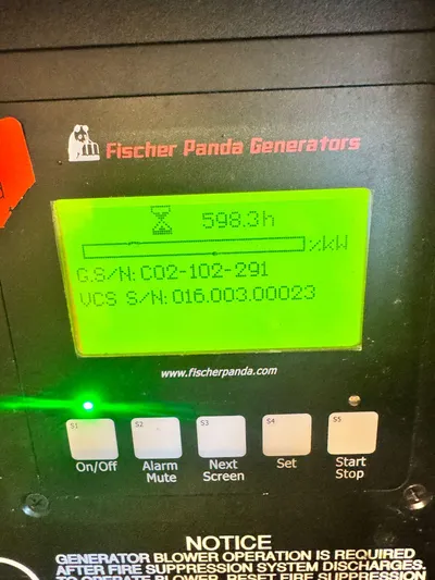  Yacht Photos Pics Fischer Panda generator display on 2016 Pursuit SC 365i Sport Coupe showing 598.3 hours.