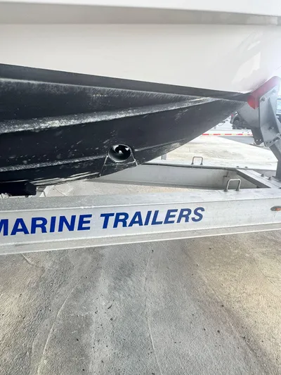  Yacht Photos Pics 2016 Pursuit SC 365i Sport Coupe on a marine trailer.