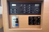 Control panel of a 2020 Lagoon 42 yacht, featuring various switches and gauges.