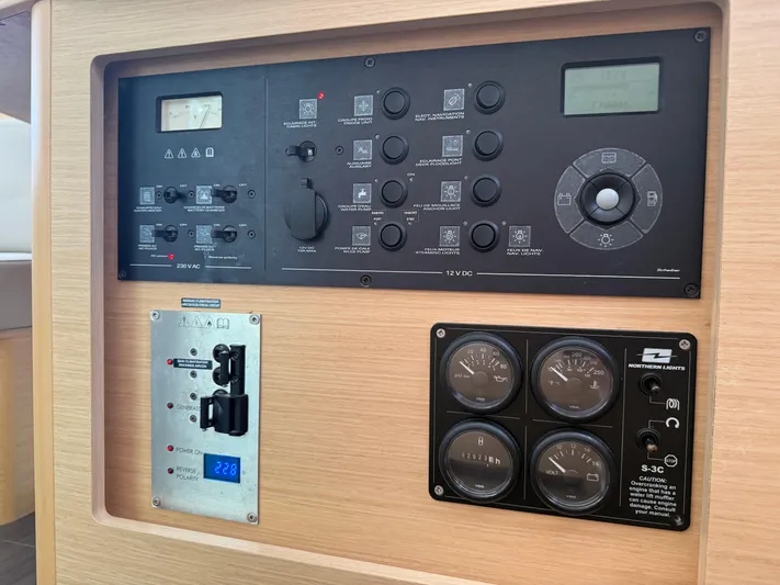 La Mer Yacht Photos Pics Control panel of a 2020 Lagoon 42 yacht with various gauges and switches.