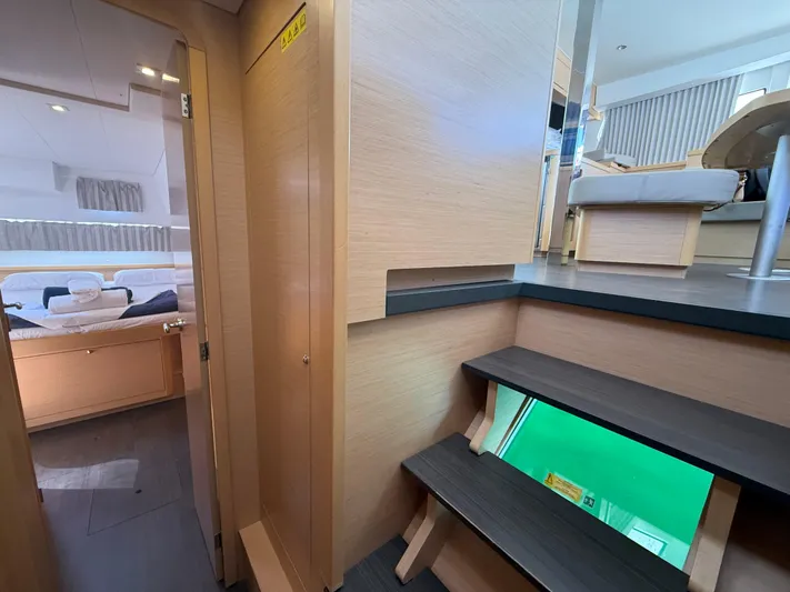 La Mer Yacht Photos Pics Interior of 2020 Lagoon 42 catamaran with modern wood finish and cozy cabin.