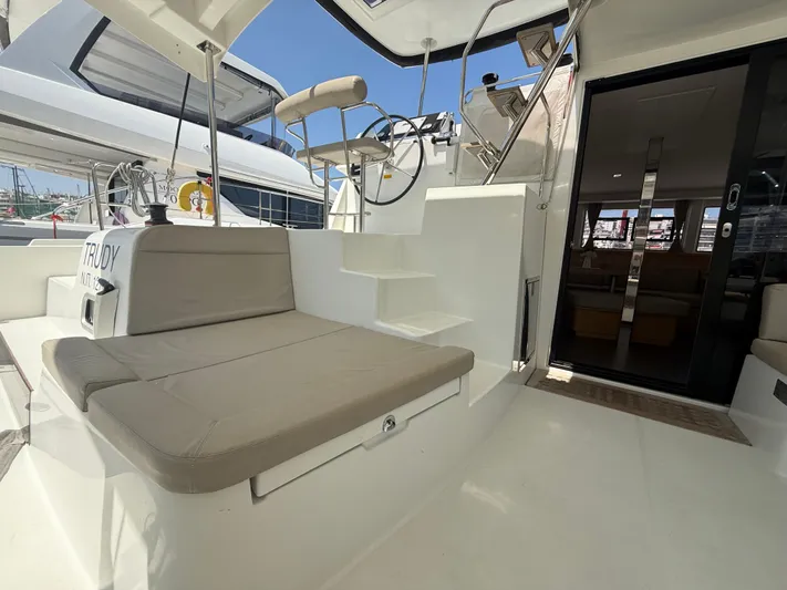 La Mer Yacht Photos Pics Lagoon 42 catamaran 2020 model, featuring outdoor seating and helm station.