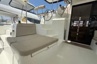 Lagoon 42 catamaran 2020 model, featuring outdoor seating and helm station.