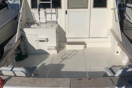 1984 Post Convertible boat deck, spacious and well-maintained, great deal opportunity.