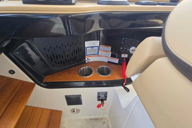  Yacht Photos Pics 2023 Sea Ray Sundancer 370 Outboard cockpit with cup holders and control panel.