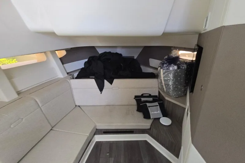  Yacht Photos Pics Interior of 2023 Sea Ray Sundancer 370 Outboard, featuring cozy seating and modern design.