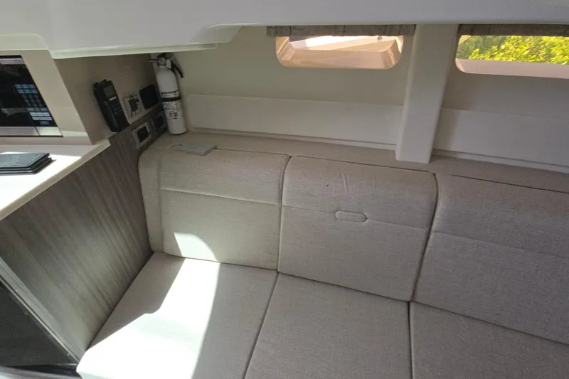  Yacht Photos Pics Interior of 2023 Sea Ray Sundancer 370 Outboard, featuring a cozy seating area.