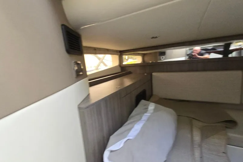  Yacht Photos Pics 2023 Sea Ray Sundancer 370 Outboard cabin interior with modern design and comfortable bedding.