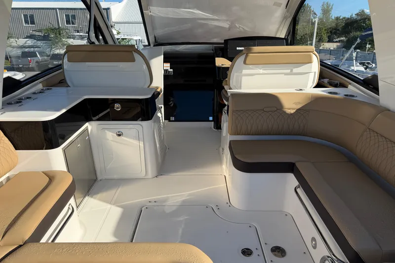  Yacht Photos Pics 2023 Sea Ray Sundancer 370 Outboard interior with luxurious seating and modern design.