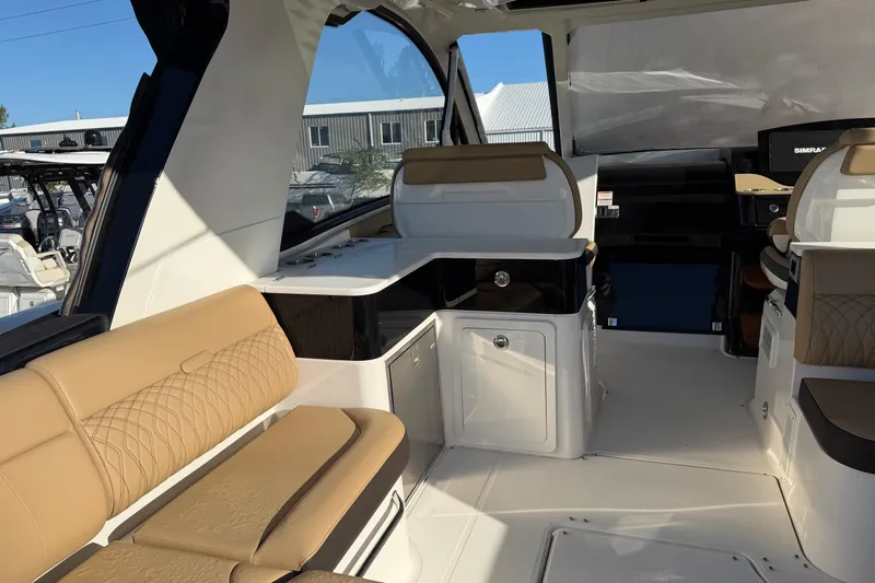  Yacht Photos Pics 2023 Sea Ray Sundancer 370 Outboard interior with luxurious seating and modern design.