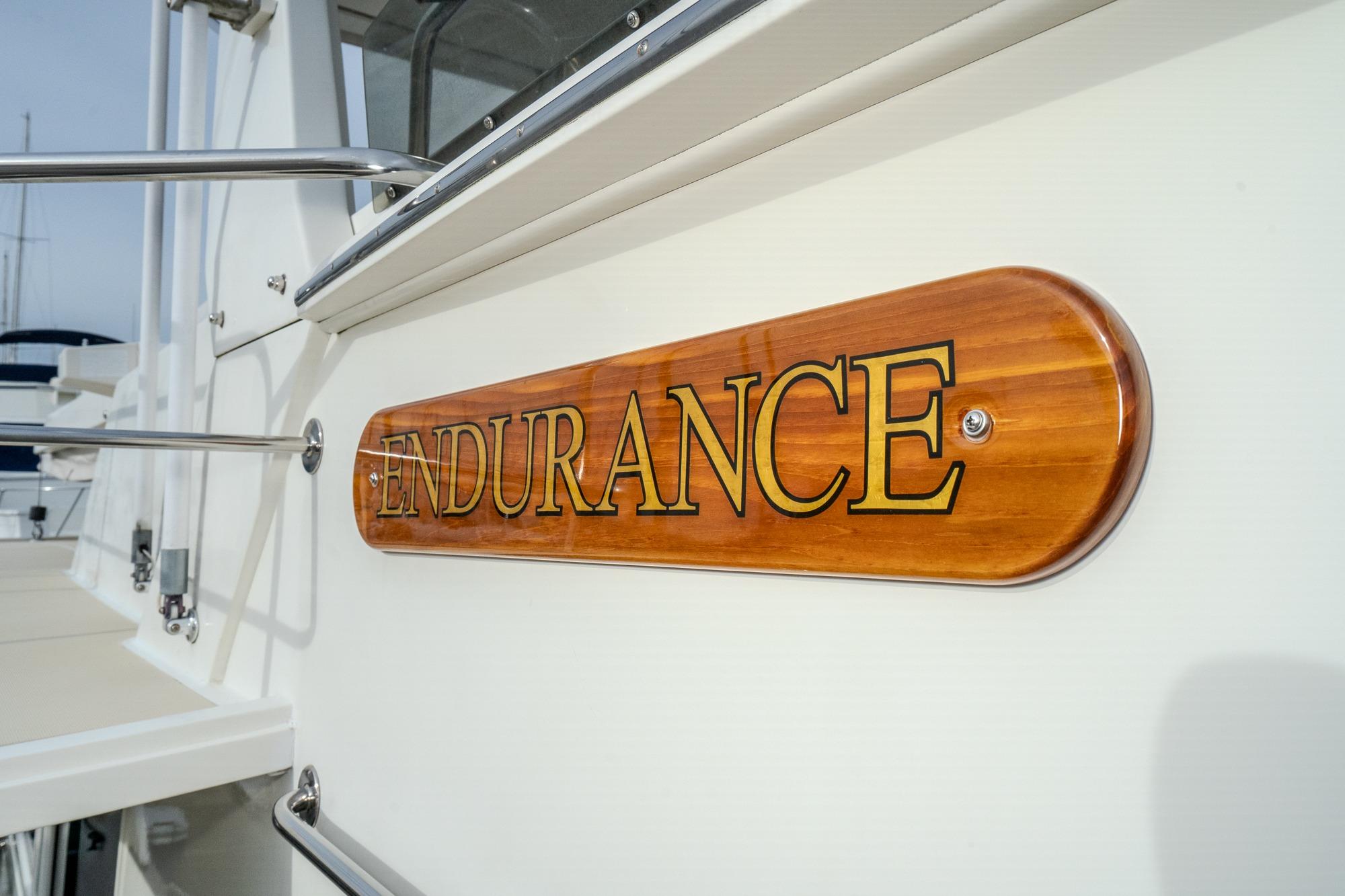 2001 Fleming 55 Pilothouse yacht with "Endurance" nameplate on wooden plaque.