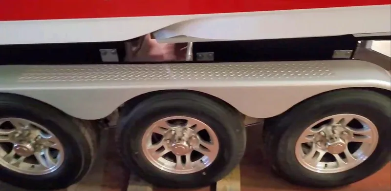  Yacht Photos Pics 2008 Donzi 35 ZR boat trailer with triple axle wheels.