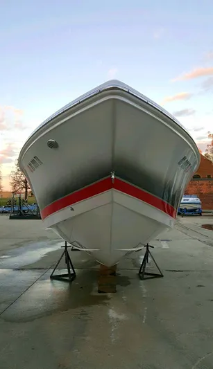  Yacht Photos Pics 2008 Donzi 35 ZR boat on stands, front view, outdoors.