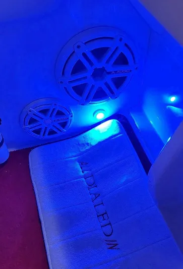  Yacht Photos Pics 2008 Donzi 35 ZR interior with blue LED lighting and speaker system.