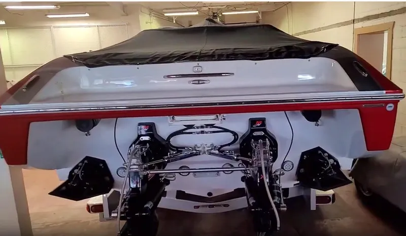  Yacht Photos Pics 2008 Donzi 35 ZR boat, rear view, in a garage setting.