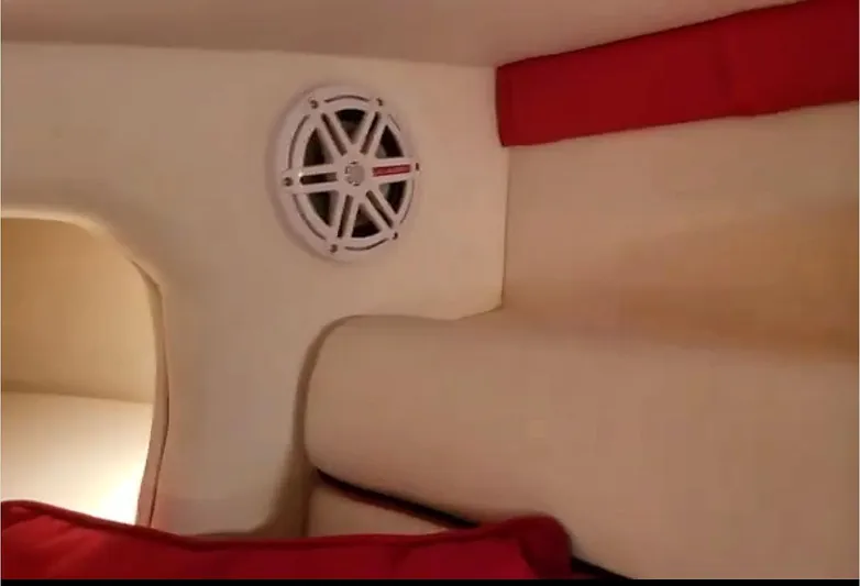  Yacht Photos Pics Interior of 2008 Donzi 35 ZR boat with speaker and red cushions.