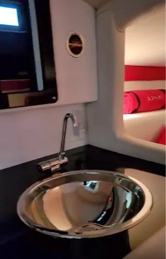  Yacht Photos Pics Interior of 2008 Donzi 35 ZR boat with modern sink and cozy cabin.