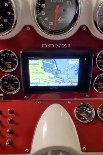  Yacht Photos Pics Dashboard of a 2008 Donzi 35 ZR boat with Garmin navigation display.