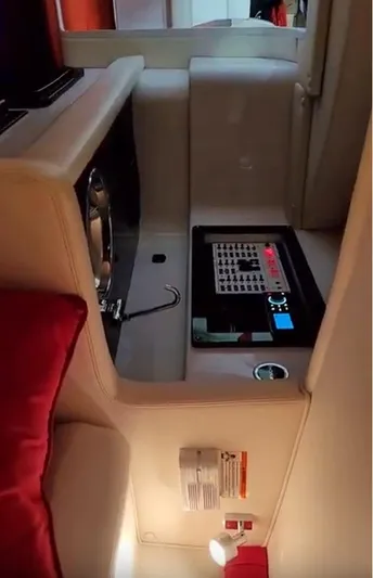  Yacht Photos Pics Interior of 2008 Donzi 35 ZR boat with control panel and seating area.