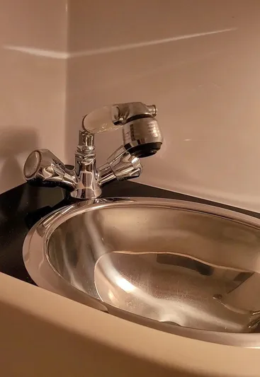  Yacht Photos Pics Chrome sink faucet in a 2008 Donzi 35 ZR boat bathroom.