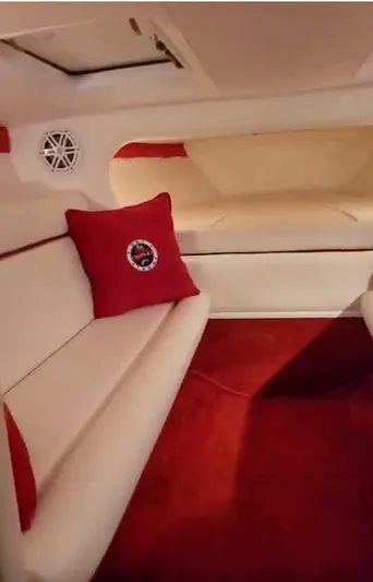  Yacht Photos Pics 2008 Donzi 35 ZR interior with red and white seating and cushion.