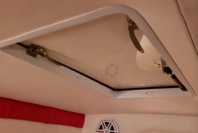  Yacht Photos Pics 2008 Donzi 35 ZR cabin interior with hatch and speaker.