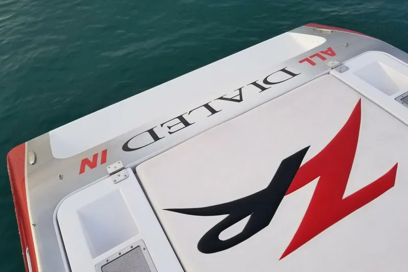  Yacht Photos Pics 2008 Donzi 35 ZR boat deck with bold graphics on water.