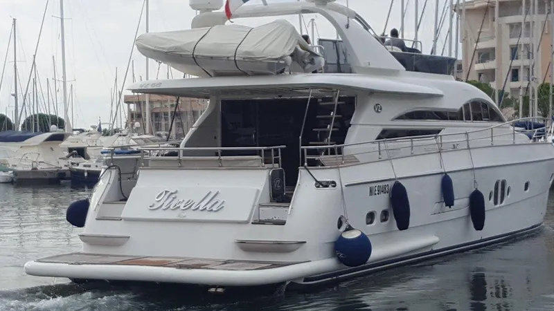M/y Tivella Yacht Photos Pics Luxury VZ 68 yacht from 2009 docked in a marina, featuring sleek design and modern amenities.