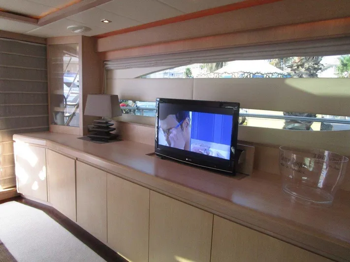 M/y Tivella Yacht Photos Pics Luxurious yacht interior with TV, modern decor, and large windows. VZ 68, 2009 model.
