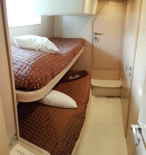 M/y Tivella Yacht Photos Pics Compact cabin with bunk beds in a 2009 VZ 68 yacht.
