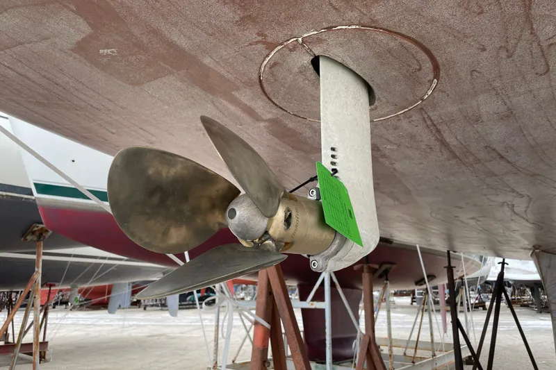 Eclipse Yacht Photos Pics Propeller of 2014 Jeanneau Sun Odyssey 439 sailboat in dry dock.