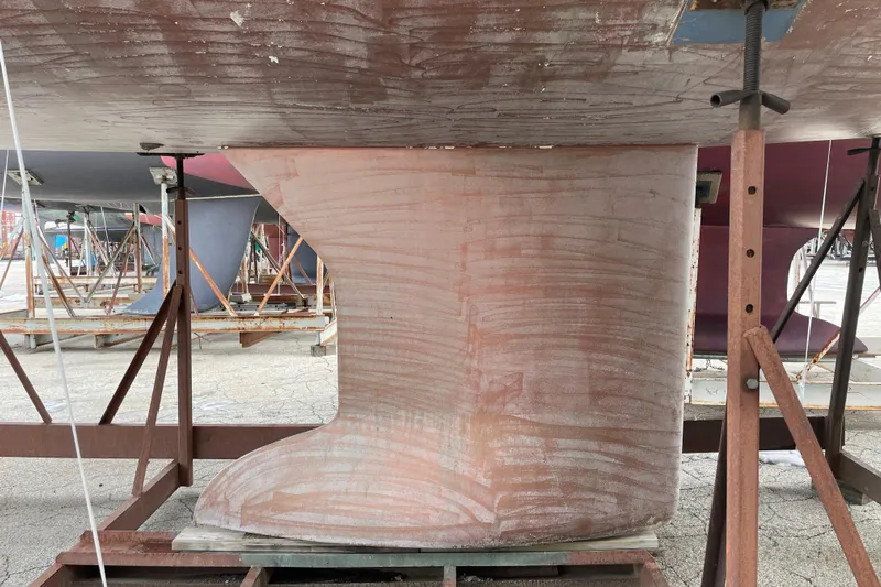 Eclipse Yacht Photos Pics 2014 Jeanneau Sun Odyssey 439 keel on dry dock, showing hull structure.