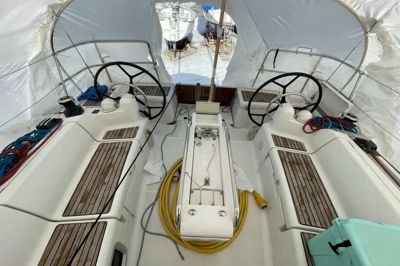 Eclipse Yacht Photos Pics 2014 Jeanneau Sun Odyssey 439 cockpit with dual steering wheels and teak seating.