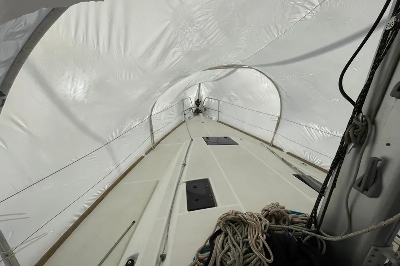 Eclipse Yacht Photos Pics 2014 Jeanneau Sun Odyssey 439 sailboat deck under protective cover.