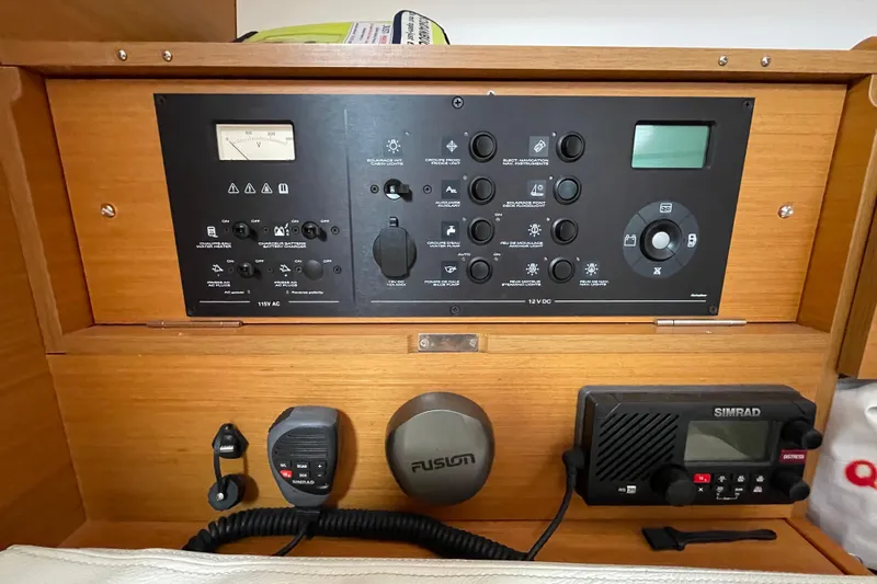 Eclipse Yacht Photos Pics Control panel of a 2014 Jeanneau Sun Odyssey 439 sailboat with navigation and communication equipment.