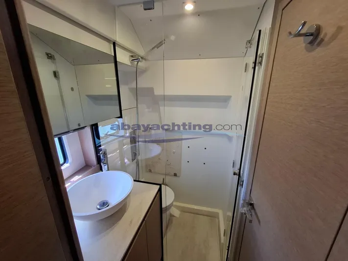  Yacht Photos Pics Modern bathroom in 2019 Prestige 420 Flybridge yacht with shower and sink.