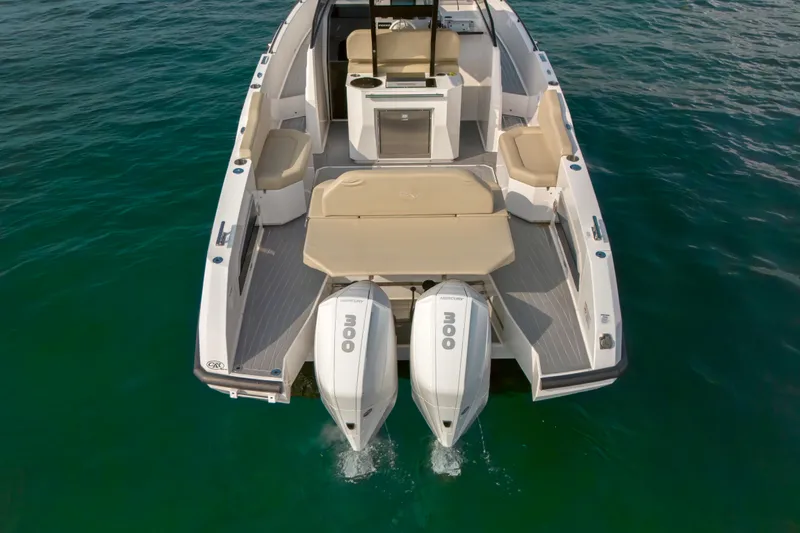  Yacht Photos Pics 2023 Rio Yachts Daytona 34 with twin 300 horsepower engines on clear water.