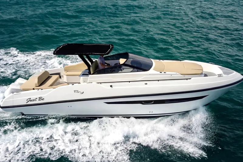  Yacht Photos Pics 2023 Rio Yachts Daytona 34 cruising on open water, showcasing sleek design and luxury features.
