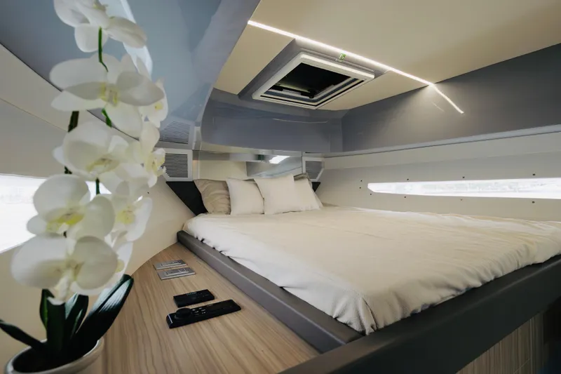  Yacht Photos Pics Luxurious interior of 2023 Rio Yachts Daytona 34 with elegant bedding and decor.