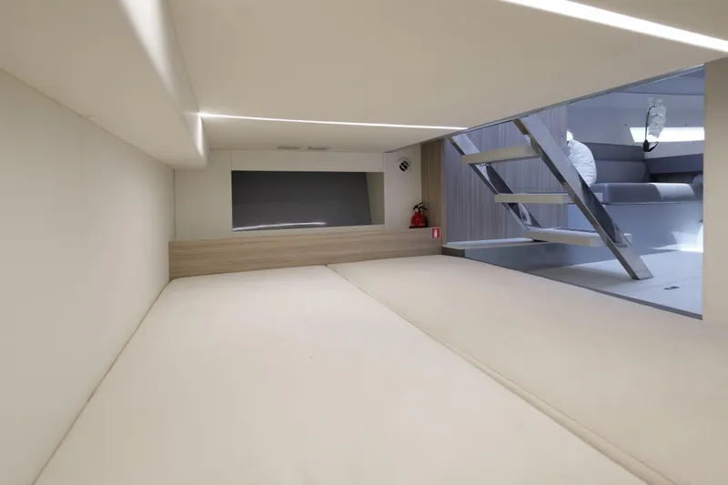  Yacht Photos Pics 2023 Rio Yachts Daytona 34 interior cabin with modern design and sleek staircase.