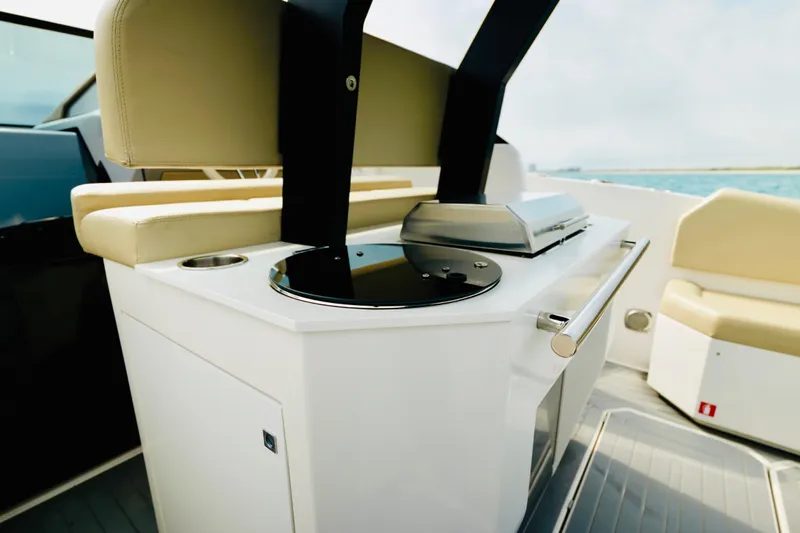  Yacht Photos Pics 2023 Rio Yachts Daytona 34 interior with modern seating and sleek kitchen area.