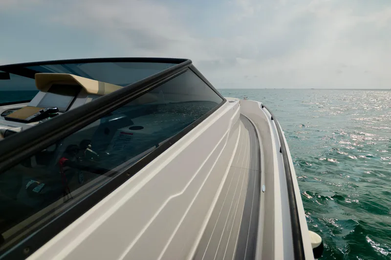  Yacht Photos Pics 2023 Rio Yachts Daytona 34 cruising on open water under a clear sky.