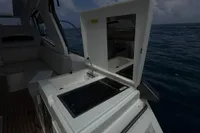 2024 Bavaria Sport 36 Open yacht with outdoor kitchen, ocean view.